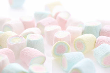 Pastel colourful marshmallows isolated in white background
