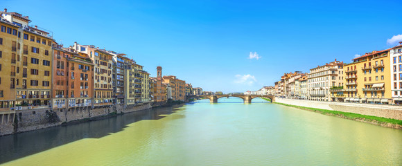 Cityscape with River Arno in Florence in sunny day. Tuscany, Italy