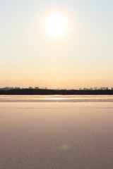 background of fresh white snow winter outdoor on the surface of the river covered with ice. freezing on the river Severnaya Dvina.