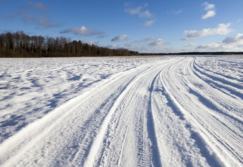 Fototapeta na wymiar Snow on the road