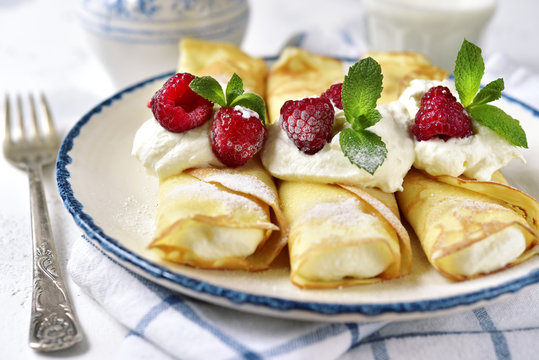 Crepes stuffed with ricotta.