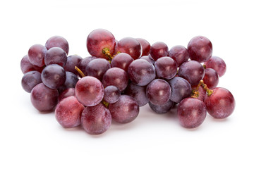 Ripe red grape isolated on white.