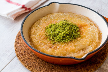 Turkish Dessert Kunefe with Pistachio Powder.