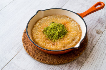 Turkish Dessert Kunefe with Pistachio Powder.