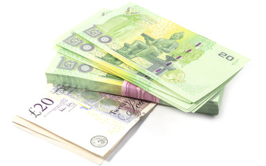United Kingdom Twenty Pound Notes and Thailand Twenty Baht Banknote.