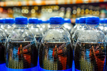 Many bottles with pepsi top view. background made by big pepsi bottles
