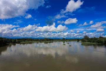 Foto op Canvas River view and dark blue sky, before raining dark blue sky water river lake mountain wildlife Thailand © Tanawat