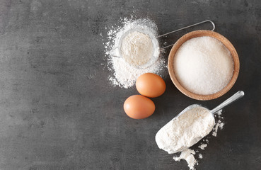 Composition with flour on gray table