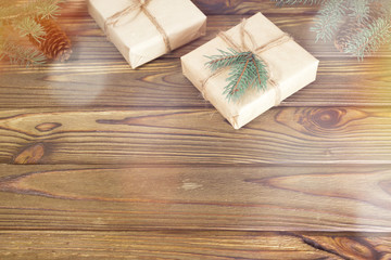 New Year, gifts, Christmas tree branches on a wooden background