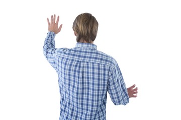 Rear view of businessman using imaginary screen