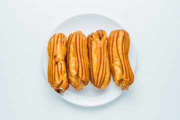 Eclairs on a white background