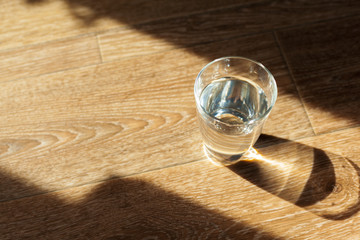 Fototapeta premium Glass of water on table
