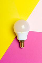 Lightbulb on colorful background