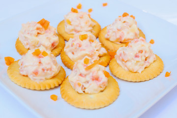 Tasty crackers with cream cheese,carrot.Healthy snacks,