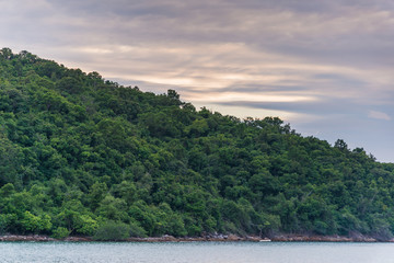 Green moutain with sunset sky.