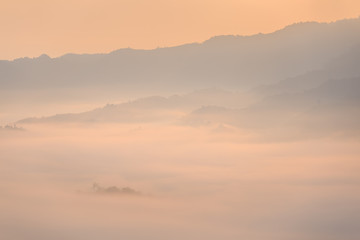 Sunshine and clouds on the morning mist At Phu Lang Ka, Phayao, Thailand