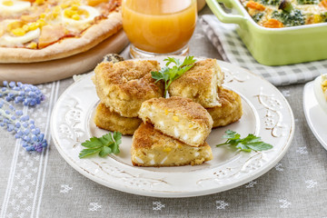 Traditional croquettes stuffed with eggs.