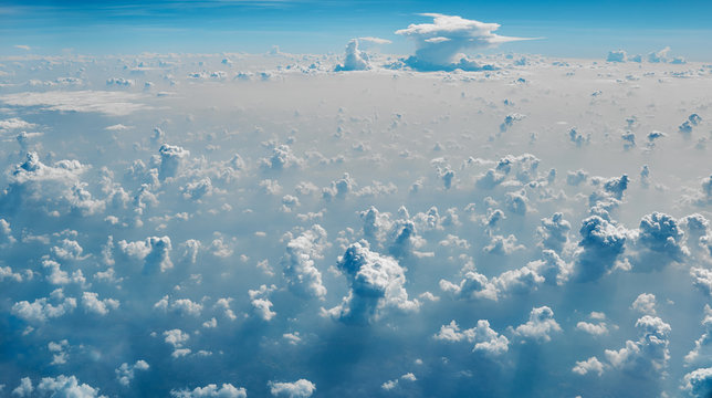 Cumulus castellanus cloud. Aerial view of vertical clouds from 10K meters.