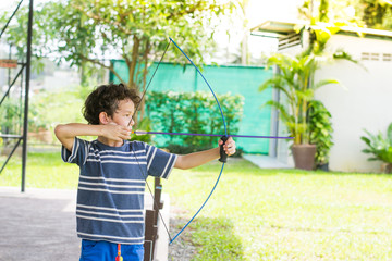 boy plays archery