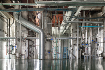 Silvery rectification columns with many pipes.