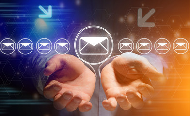 View of a Concept of sending message with email icon around - Communication and technology concept