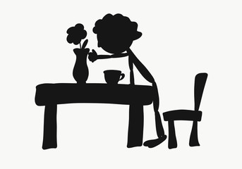 A man reaches for a vase with a flower