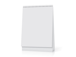 A white paper  calendar stands on the table. Mock Up Vector Template