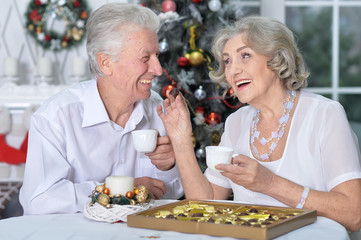 couple  with cups of tea