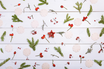 Christmas, New Year, Autumn background, flat lay natural ornaments and fir branches, berries, rose hips ,winter branches covered with moss, empty space for greeting text, congratulations, invitations.