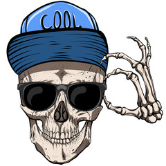 Glasses and cap on the skull. Fashionable guy.
