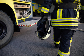 Fototapeta premium Rescue firefighter in safe helmet and uniform