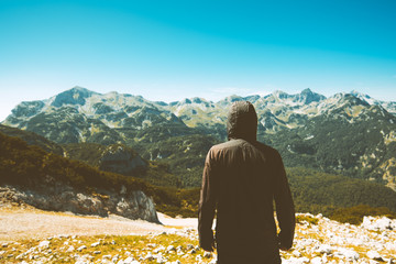Mountain hiker looking into beautiful landscape