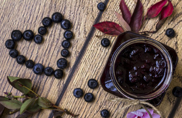 Blueberry jam; Blurred blueberries formed into a heart shape