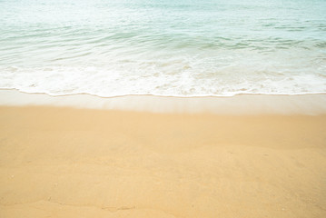Fototapeta na wymiar Clear seawater and sand beach, natural tropical background