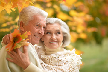  caucasian senior couple with leaves 