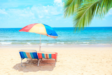 Ka-ron Beach at Phuket , Thailand. White sand beach with beach umbrella. Summer, Travel, Vacation and Holiday concept.
