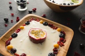 Yogurt and fruits in plate