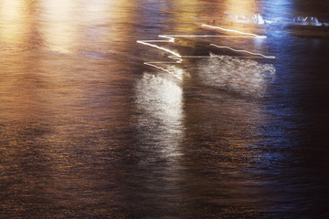 lIGHT TRAILS BY A BOAT AT NIGHT TIME IN THE SEA OF BOSPHORUS, istanbul