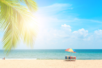 Ka-ron Beach at Phuket , Thailand. White sand beach with beach umbrella. Summer, Travel, Vacation and Holiday concept.