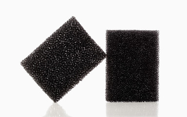 Closeup of Two Black Plastic Pieces
