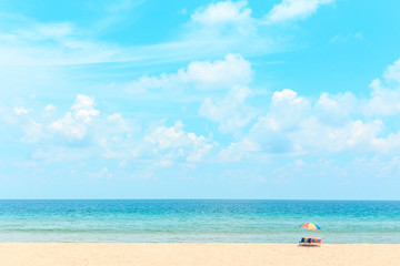Fototapeta na wymiar Ka-ron Beach at Phuket , Thailand. White sand beach with beach umbrella. Summer, Travel, Vacation and Holiday concept.