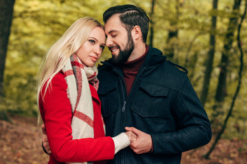 Fototapeta premium happy couple in autumn park