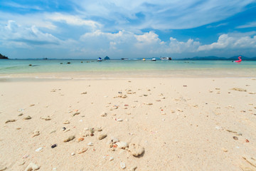 Kai island, Phuket, Thailand. Small tropical island with white sandy beach and blue transparent water of Andaman sea.