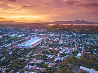 Orange color dusk in Managua city