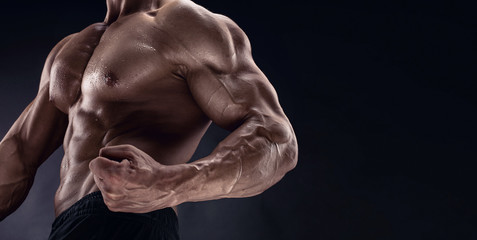 man bodybuilder showing muscular body