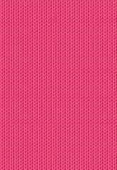 Pink knitted background. Seamless texture