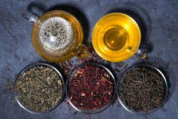 assortment of dry tea on a dark background