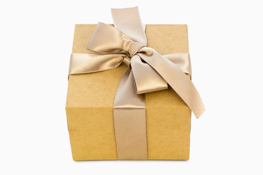 Gift box with golden ribbon isolated on white