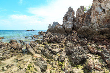 Kai island, Phuket, Thailand. Small tropical island with white sandy beach and blue transparent water of Andaman sea.