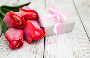 Spring tulips flowers and gift box